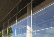 Structural glazing system in buildings